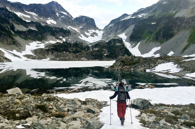Kate Zessel navigates the melting snow of Tricouni. [Photo] Abby Cooper