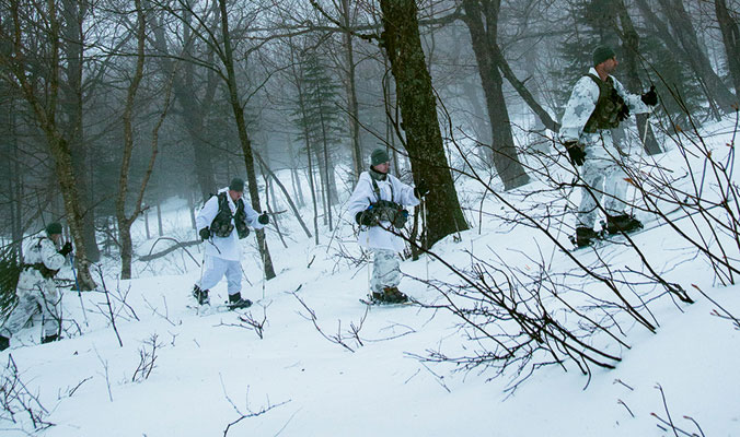 Westover leads the whiteout charge through woods to start the weeklong annual training. Bolton Valley, Vt. [Photo] Cyril Brunner 