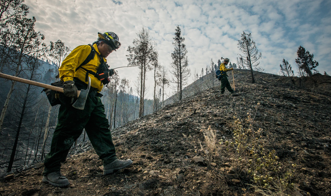 "Department of the Interior, Indian Affairs (BIA) Southern Plains Initial Attack Type 2 Crew Ryan Blackstar, is a Sawyer B Faller, looking for hotspots of hot embers above or below the ground." | Beaver Creek fire, Hailey, Idaho | Photo: U.S. Department of Agriculture