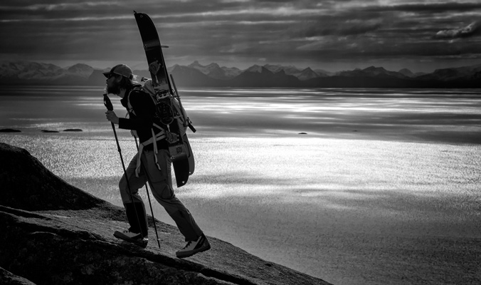 Kyle Miller hikes in view of the Atlantic Ocean. [Photo] Jason Hummel
